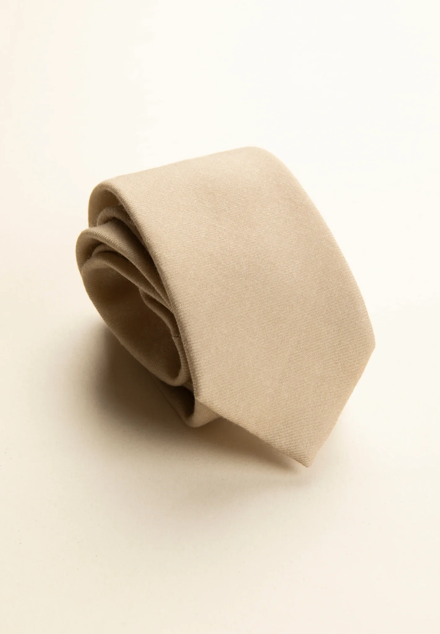 Cravatta lana beige unita