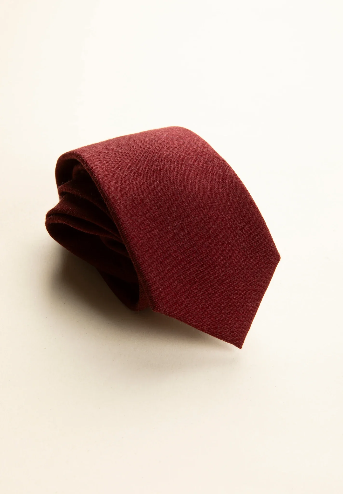 Cravatta lana bordeaux unita